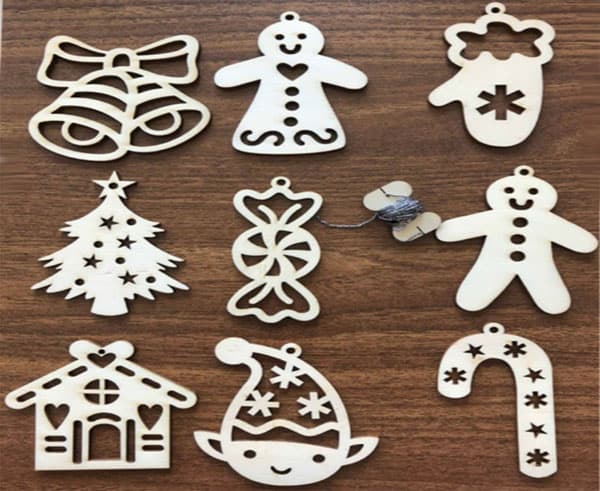 Novogodišnji drveni ukrasi 9 komada seA